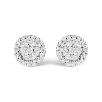 Pair of white metal round stud earrings with clustered white gemstones in prong setting, front angle view.