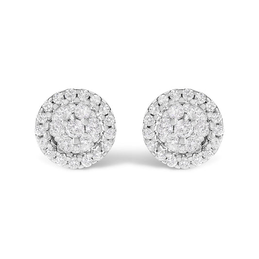 Pair of white metal round stud earrings with clustered white gemstones in prong setting, front angle view.