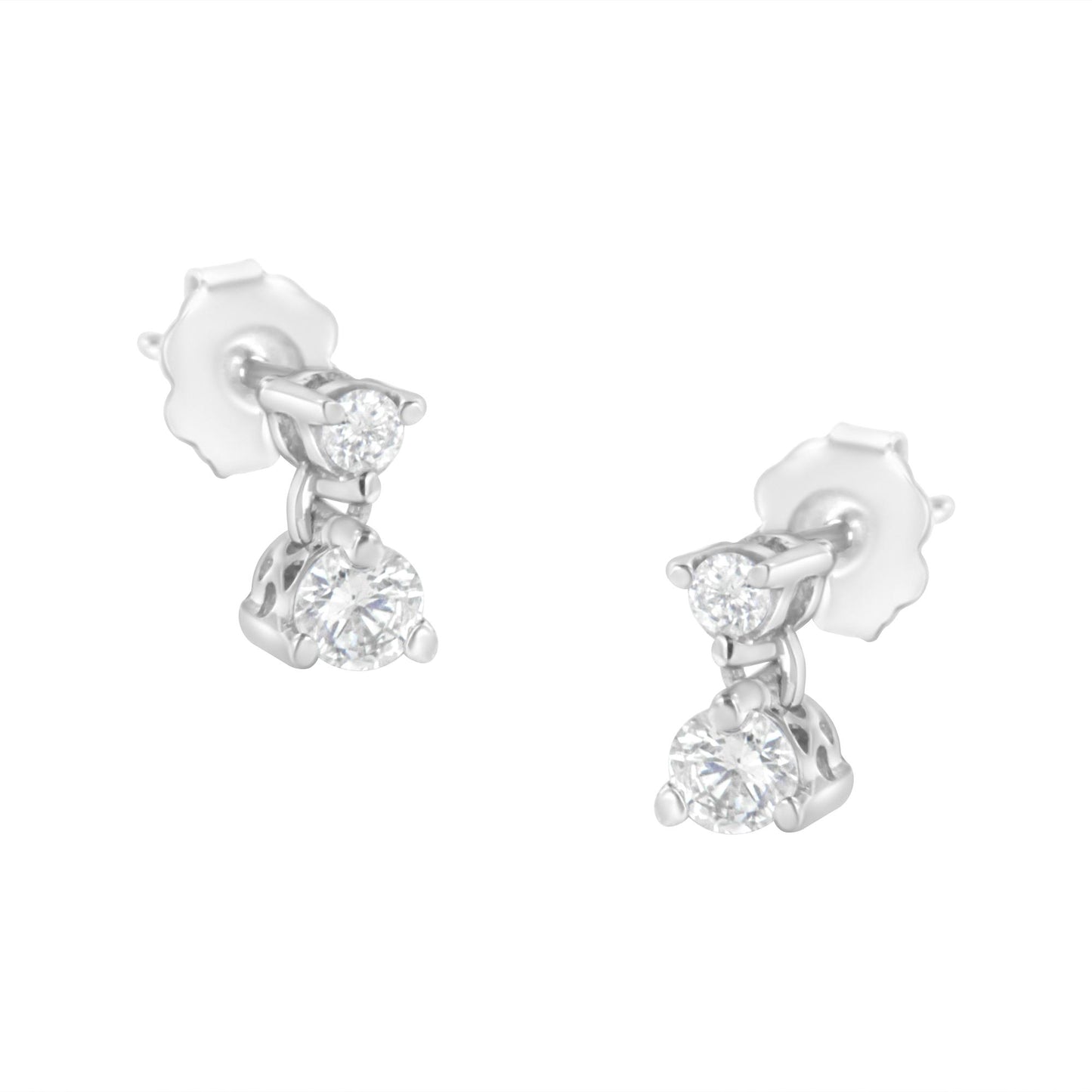 Pair of white metal earrings with two round white gemstones in prong settings, shown from a slightly angled front view.