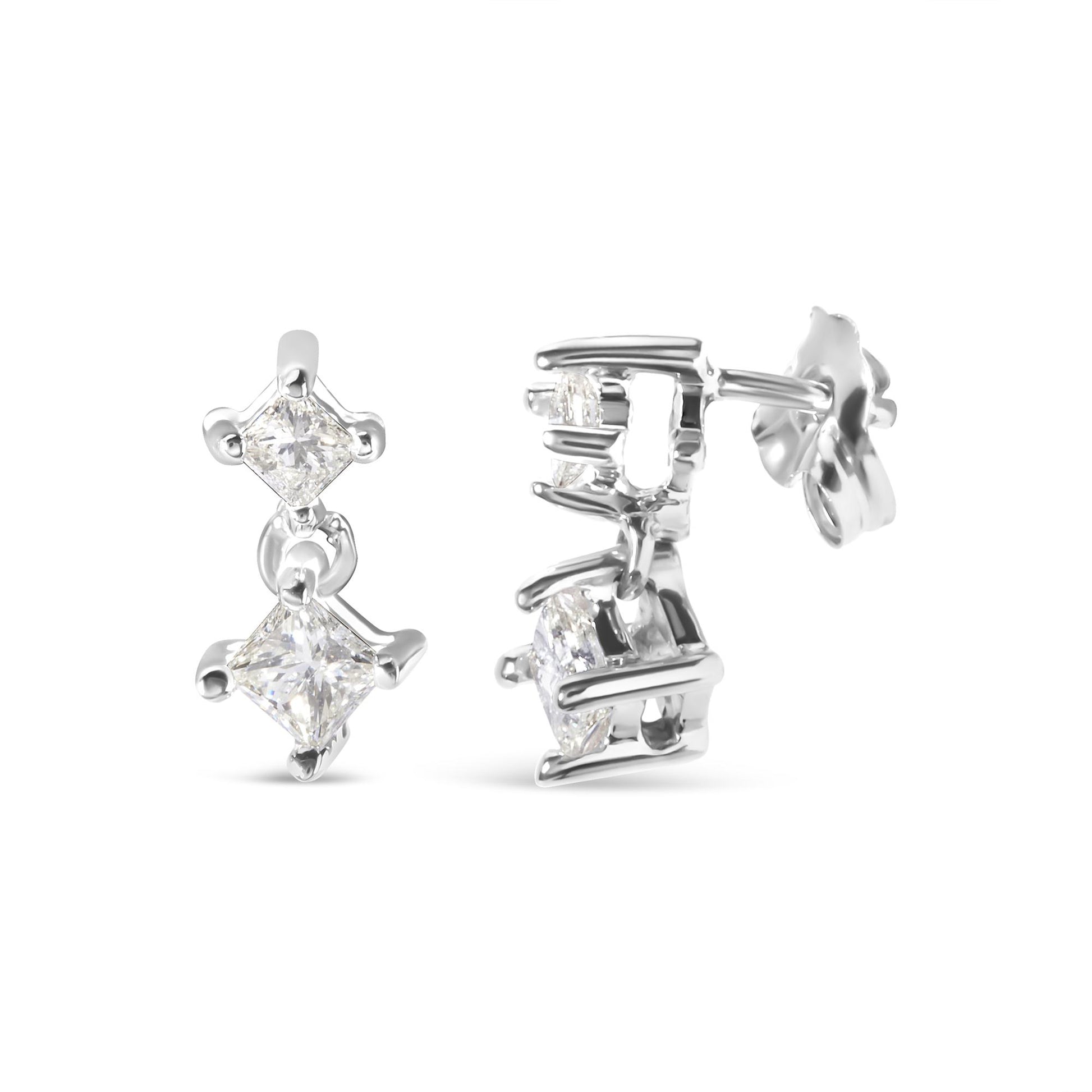 Front and side angle view of white metal earrings featuring two princess-shaped white gemstones in prong settings.