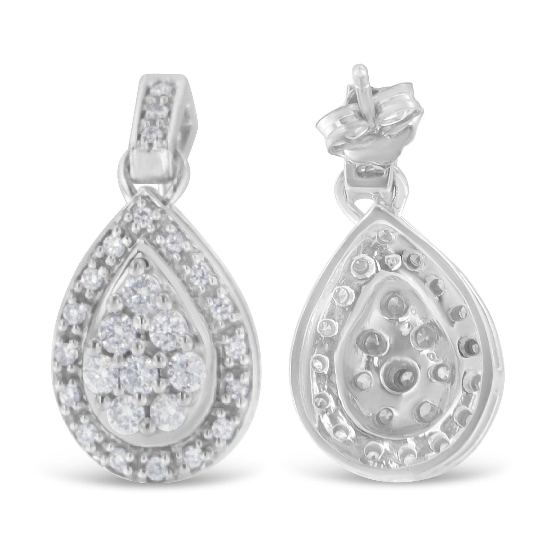 Front and back view of white metal teardrop-shaped earrings with round white gemstones in prong settings, photographed from the front.