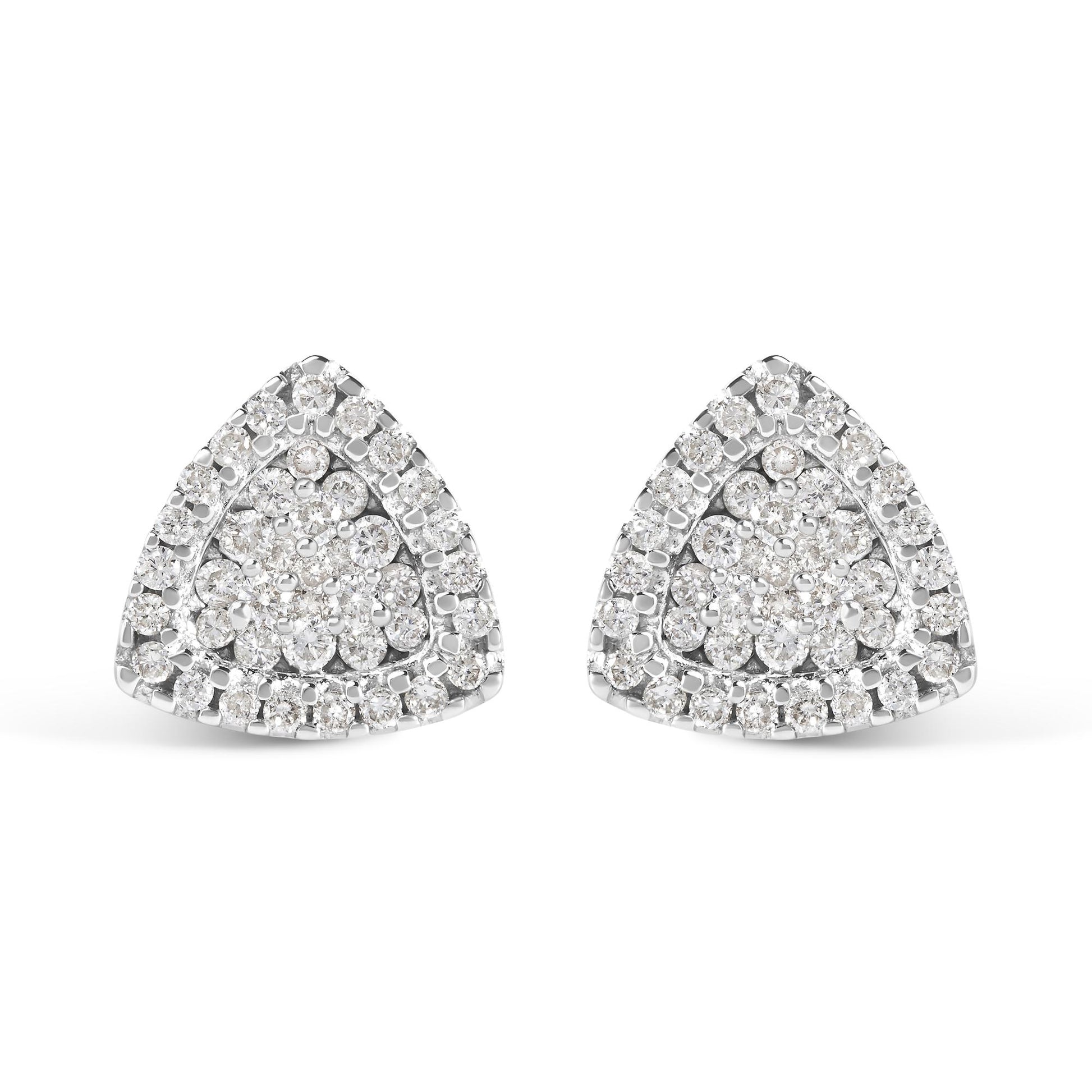 Front view of white metal triangular earrings with multiple round white gemstones in prong settings.