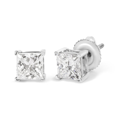 Close-up front and side angle of white metal stud earrings with princess shape white gemstones in 4-prong settings.