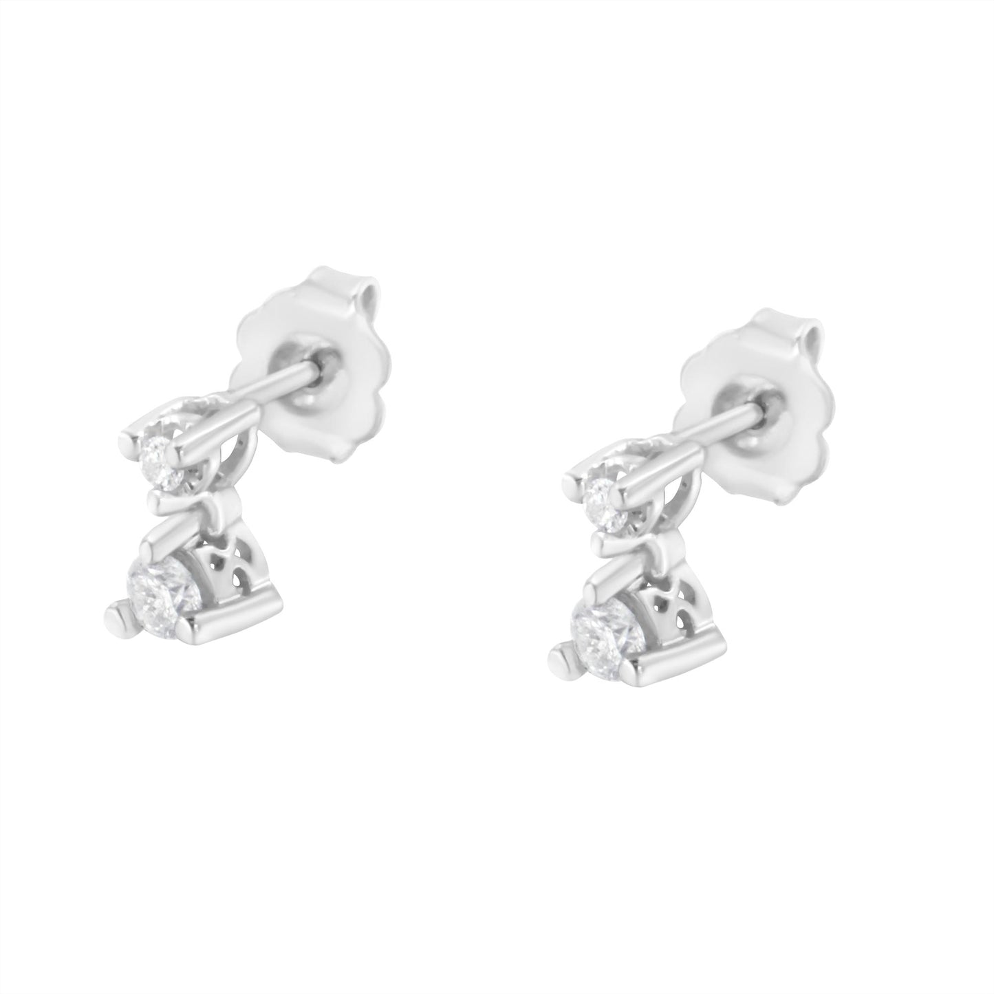 Pair of white metal stud earrings with two round white gemstones in 3-prong settings each, shown from a rear angle.