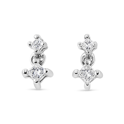 Front view of white metal earrings featuring two princess-shaped white gemstones in prong settings on each earring.