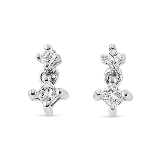 Front view of white metal earrings featuring two princess-shaped white gemstones in prong settings on each earring.