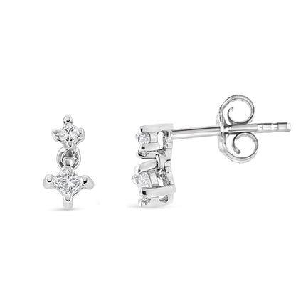 Pair of white metal earrings with prong-set princess-shaped white gemstones, shown from front and side angles.