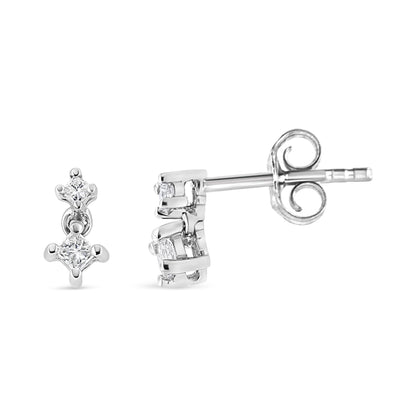Close-up front and side view of white metal earrings with two princess-shaped white gemstones in prong settings, shown against a white background.