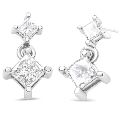 Front and angled view of white metal earrings with two princess shape white gemstones each in prong settings.