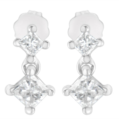 Front view of white metal earrings each featuring two princess-shaped white gemstones in prong settings connected vertically.