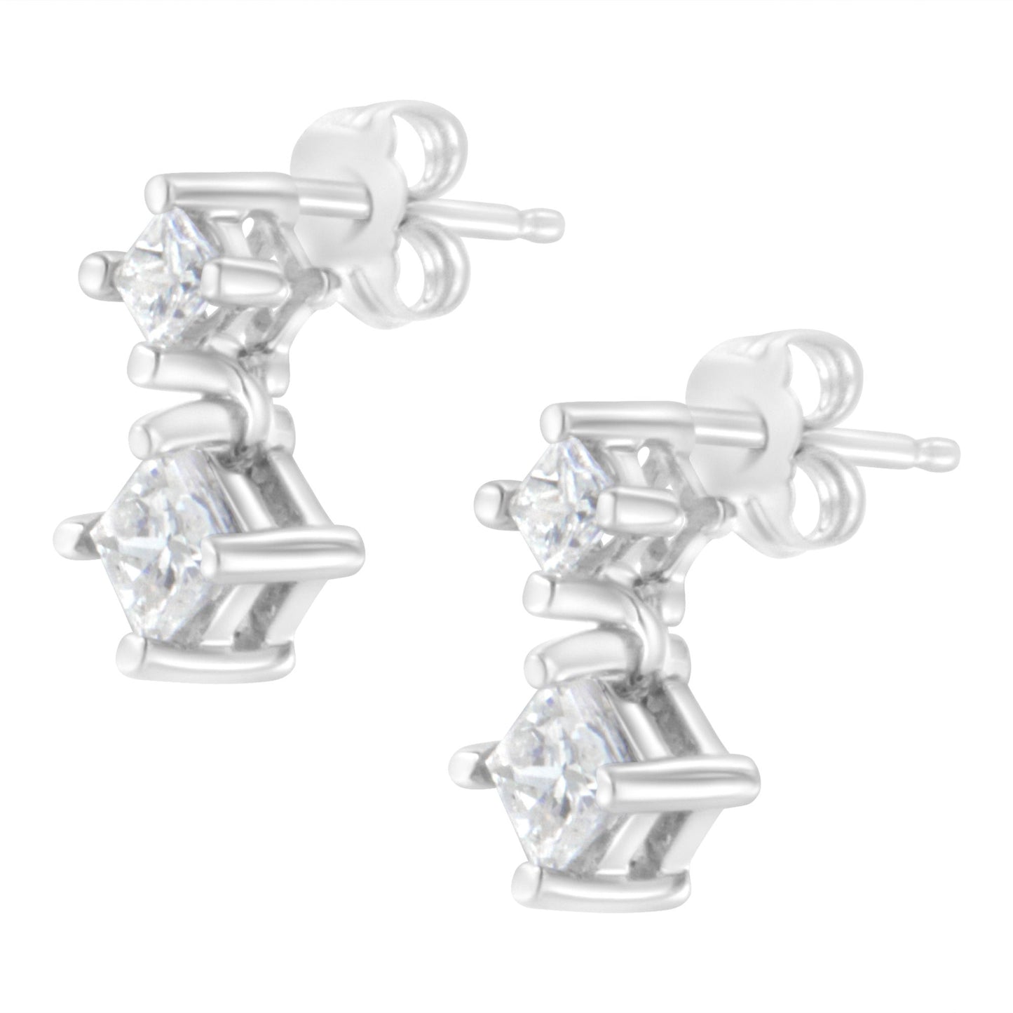 Pair of white metal earrings with two princess-shaped white gemstones each in prong settings, shown from a front angled view.