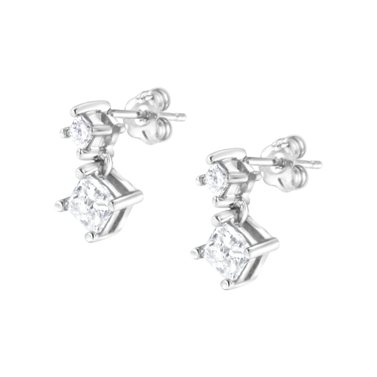 Pair of white metal earrings with two prong-set white princess-shaped gemstones each, shown from a frontal angle.
