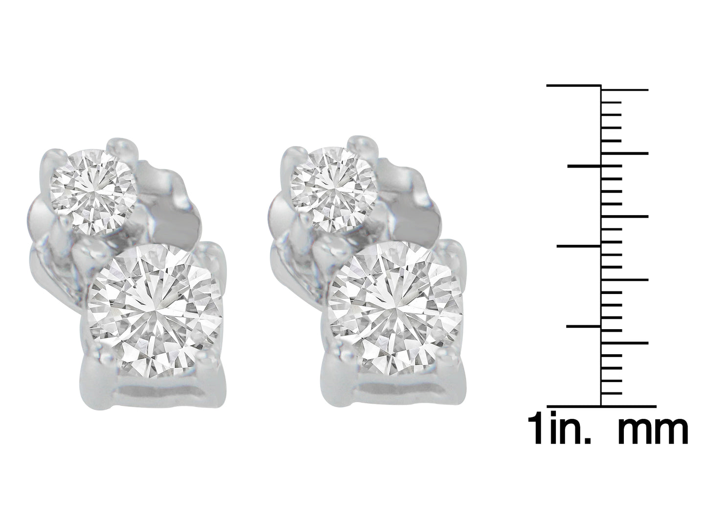 Close-up front view of white metal earrings with two round white gemstones in prong settings, shown next to a ruler for size reference.