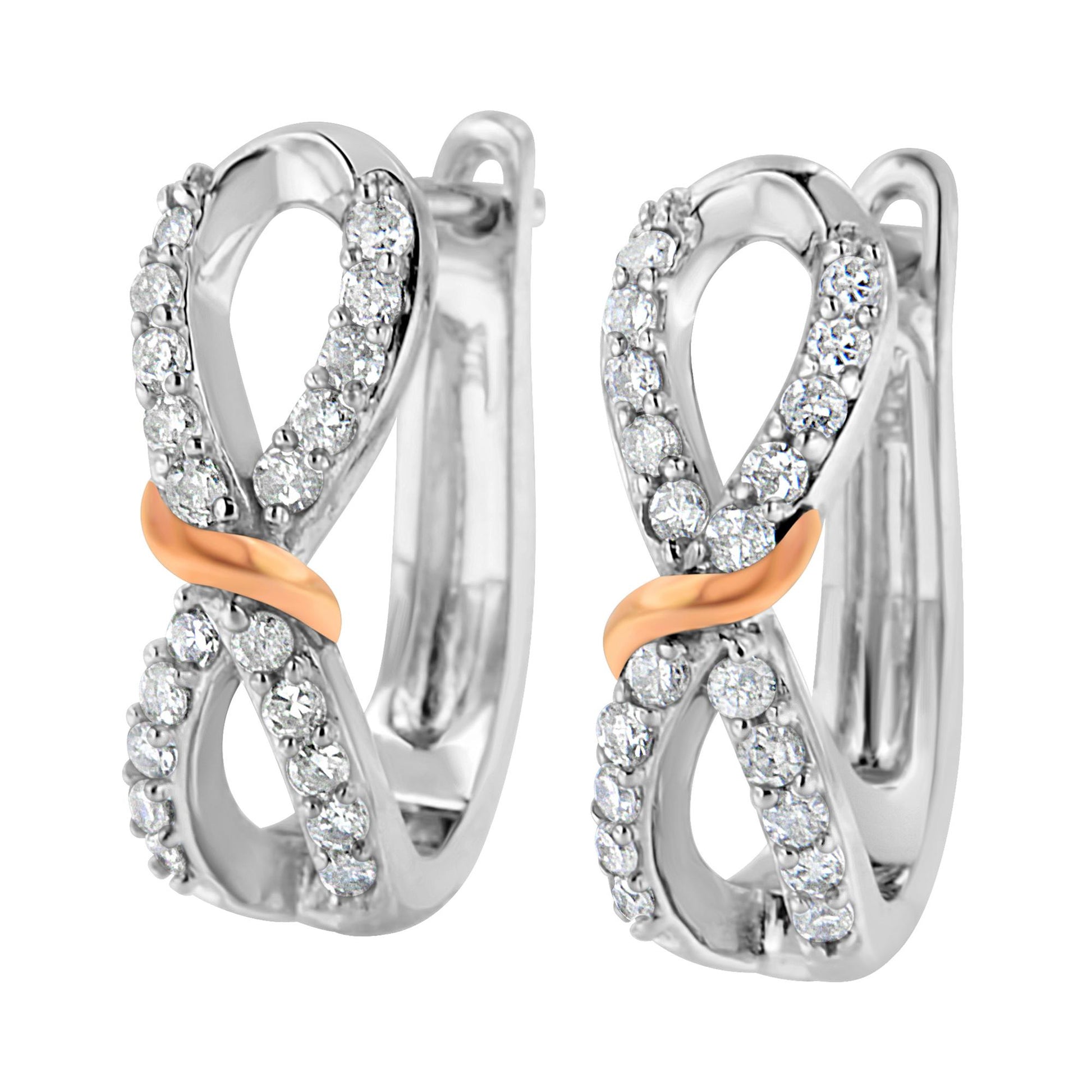 Front angle view of white and rose metal earrings featuring an infinity design with round white gemstones in a prong setting.