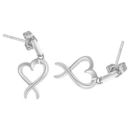 Pair of white metal earrings shaped as intertwined hearts, shown from a top angled view.