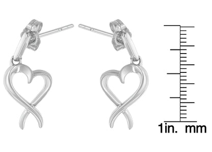 Pair of white metal earrings in an open heart and loop design, shown front-facing with a size ruler on the side.