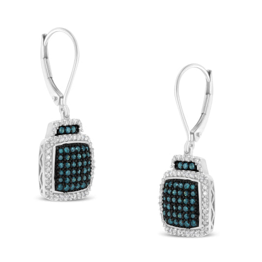 Front angled view of white metal earrings featuring square-shaped drops with prong-set white gemstones surrounding pave-set blue gemstones.