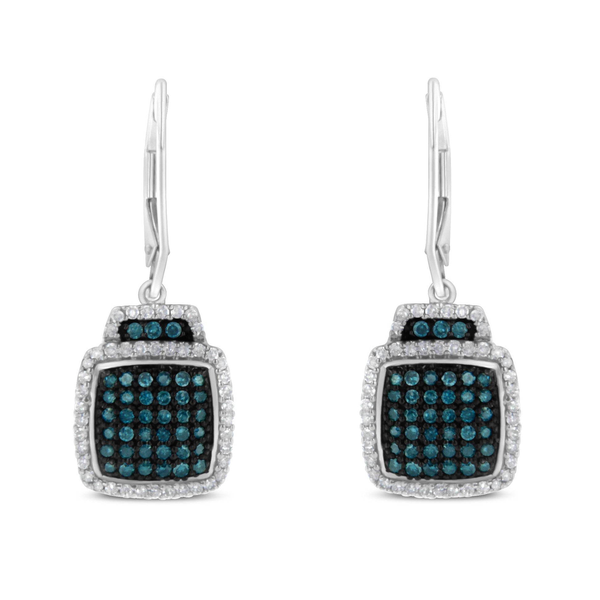 Front-facing image of a pair of white metal earrings with square-shaped heads featuring prong-set white gemstones around the edges and pave-set blue gemstones in the center.
