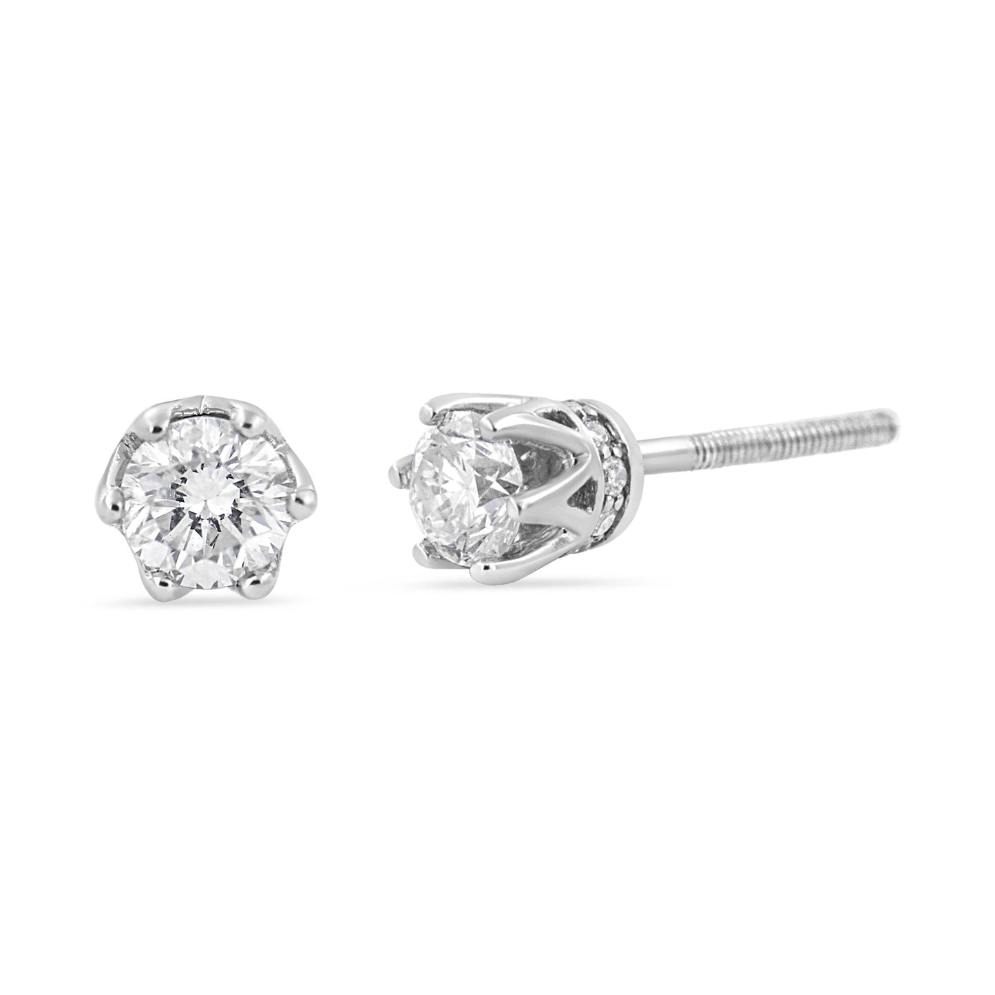 Front and side view of a pair of white metal stud earrings with round white gemstones in six-prong settings and additional small round white gemstones in pave setting around the base, shown on a white background.