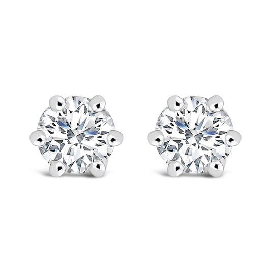 Pair of white metal stud earrings with round white gemstones in six-prong settings, shown from the front on a white background.