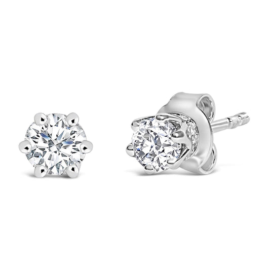 Close-up front and side view of a pair of white stud earrings featuring round white gemstones in six-prong and pave settings.