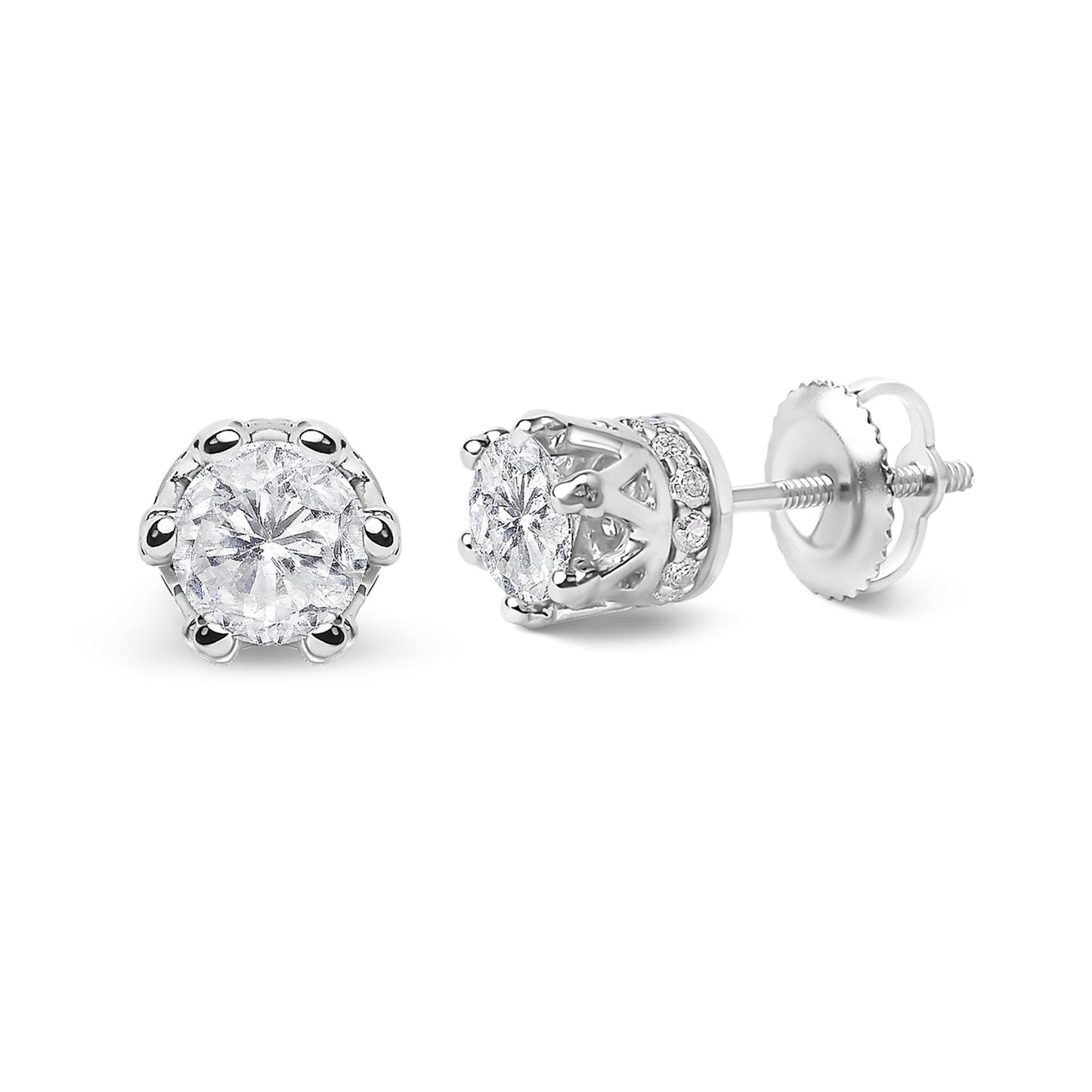 Close-up front and side view of white metal stud earrings featuring a round white gemstone in prong setting, surrounded by small round white gemstones in pave setting.