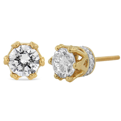 Close-up front and side view of yellow metal stud earrings featuring a large round white gemstone in prong setting and a band of smaller round white gemstones in pave setting around the base.