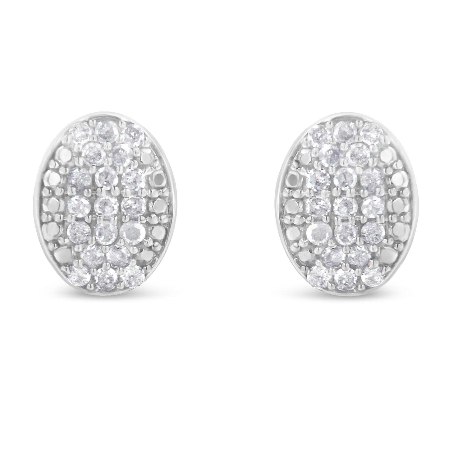 Front-facing view of a pair of white metal oval earrings featuring multiple round white gemstones in prong settings.