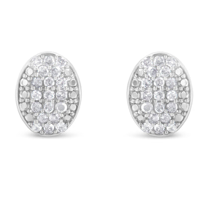 Front-facing view of a pair of white metal oval earrings featuring multiple round white gemstones in prong settings.