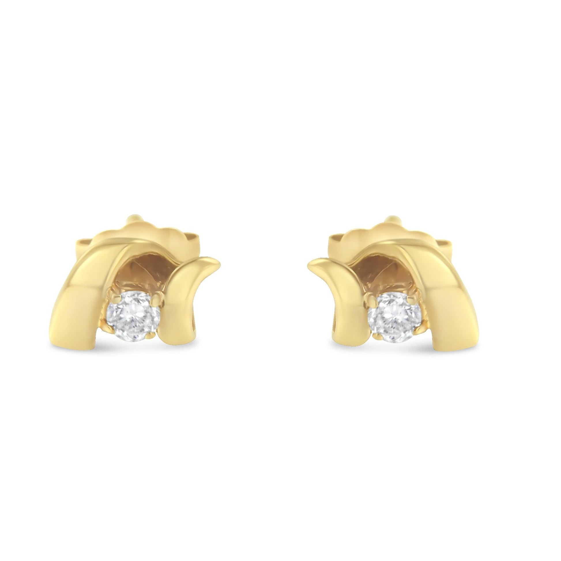 Front view of yellow metal stud earrings with a round white gemstone in prong setting.