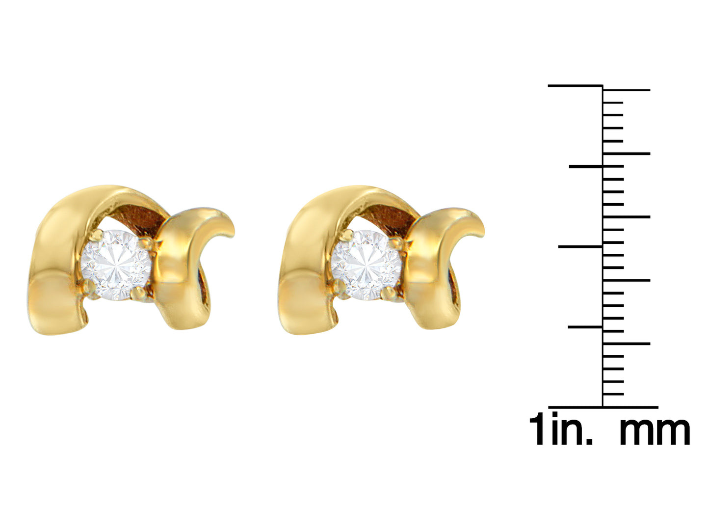 Close-up front view of yellow metal earrings with round white gemstones in prong settings, shown next to a ruler for size reference.