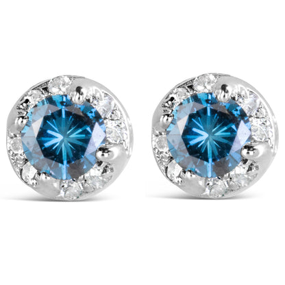 Front view of white round stud earrings featuring a central blue gemstone surrounded by smaller white gemstones in prong settings.