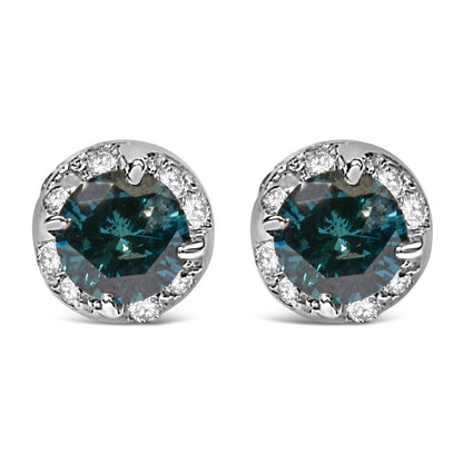 Front-facing view of white metal stud earrings featuring a central blue gemstone in prong setting surrounded by smaller white gemstones in pave setting.