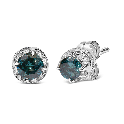 Pair of white metal stud earrings with round blue gemstones prong set in center, surrounded by round white gemstones in pave setting, shown from front and side angles.