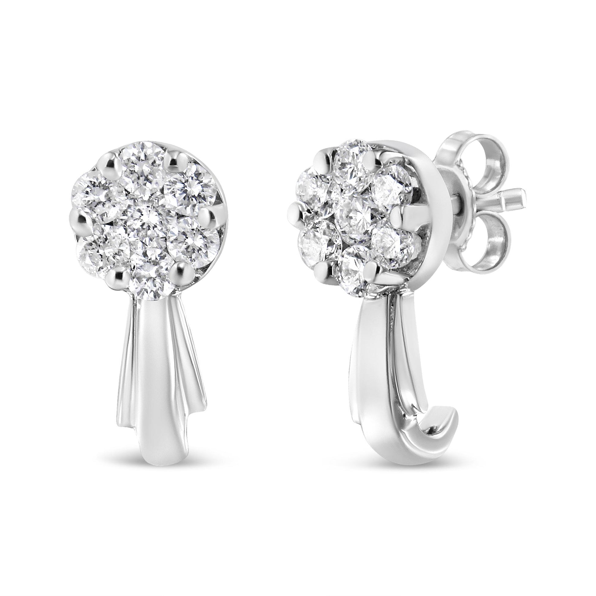 Pair of white metal earrings with clusters of round white gemstones in prong settings, shown from front and side angles.
