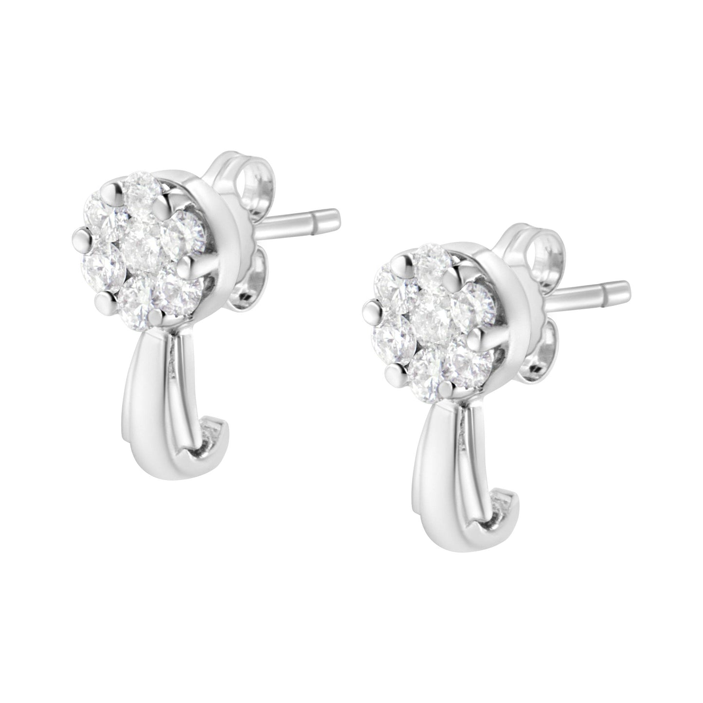 Close-up side angle of a pair of white metal stud earrings with cluster round white gemstones in prong settings and a curved metal detail hanging below.