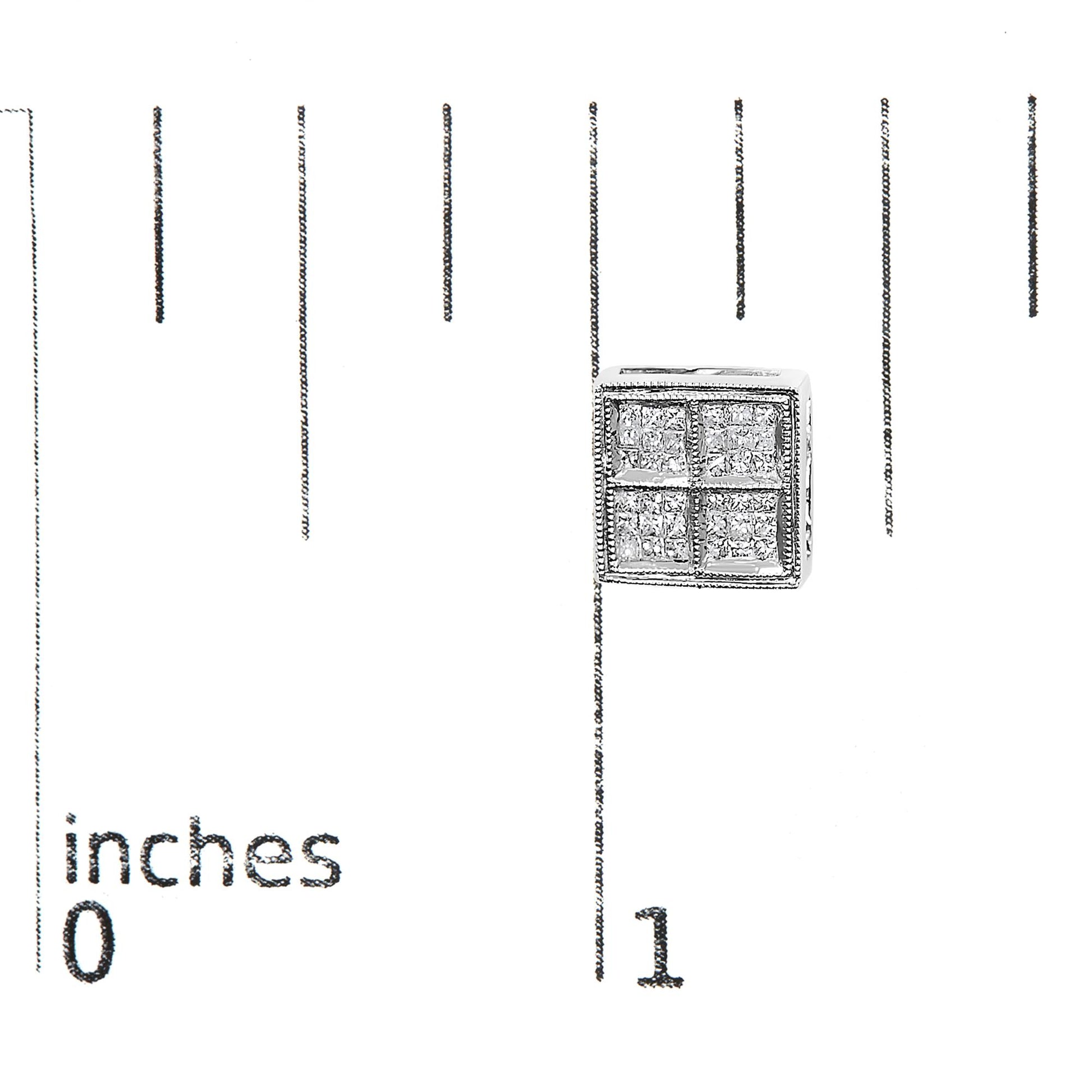 Close-up front angle of a square-shaped white metal earring with princess cut white gemstones in an invisible setting, placed on a ruler for size reference.