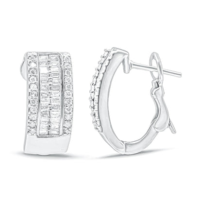 Pair of white metal hoop earrings with rectangular front panels featuring pave-set round white gemstones flanking channel-set baguette-shaped white gemstones, shown at a slight angle on a white background.