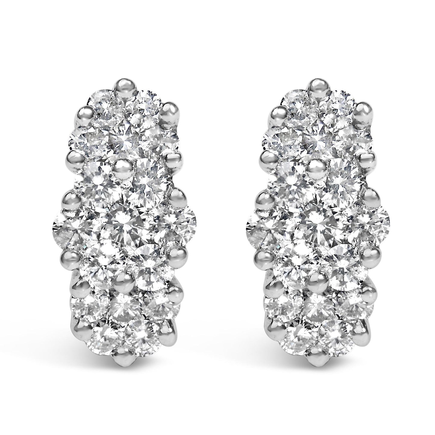 Close-up front view of yellow metal earrings with multiple round white gemstones in prong settings.