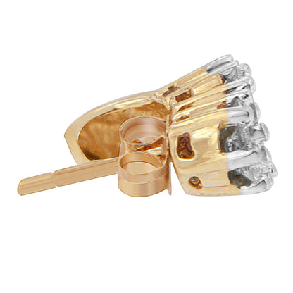 Close-up side angle of a yellow metal stud earring with multiple prong-set round white gemstones.