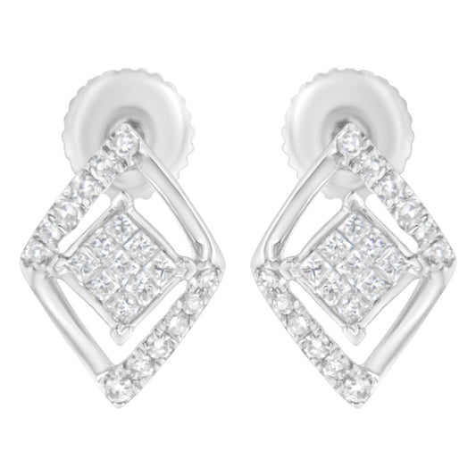 Close-up front view of white metal earrings featuring a geometric design with round prong-set white gemstones outlining a diamond shape and smaller princess-cut invisible-set white gemstones clustered in the center.