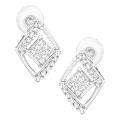 Pair of white metal stud earrings with a square design, featuring round white gemstones in prong settings around the edges and princess-shaped white gemstones in invisible settings in the center, shown at a slight angle.