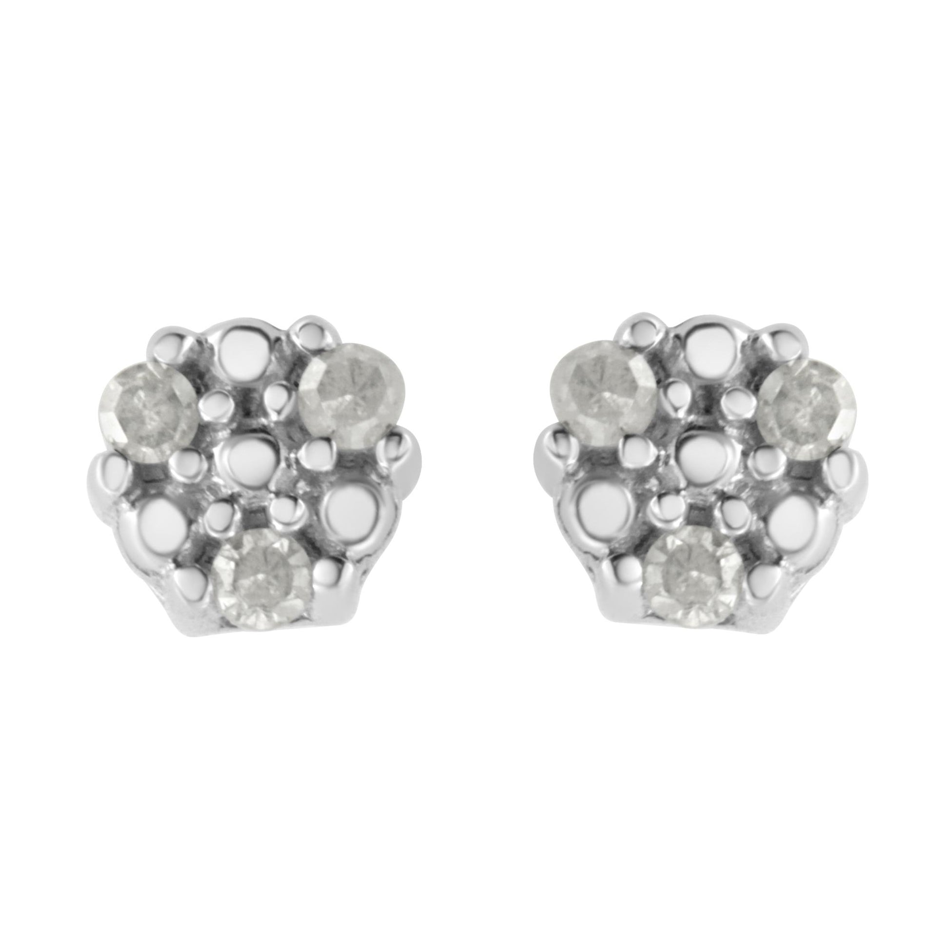 Front view of a pair of white metal stud earrings with multiple round white gemstones in prong settings.