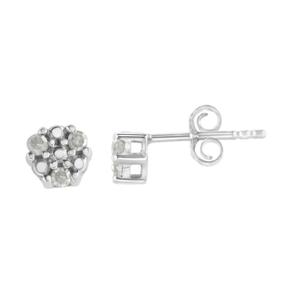 Pair of white metal stud earrings with round white gemstones in prong settings, shown from front and side angles.