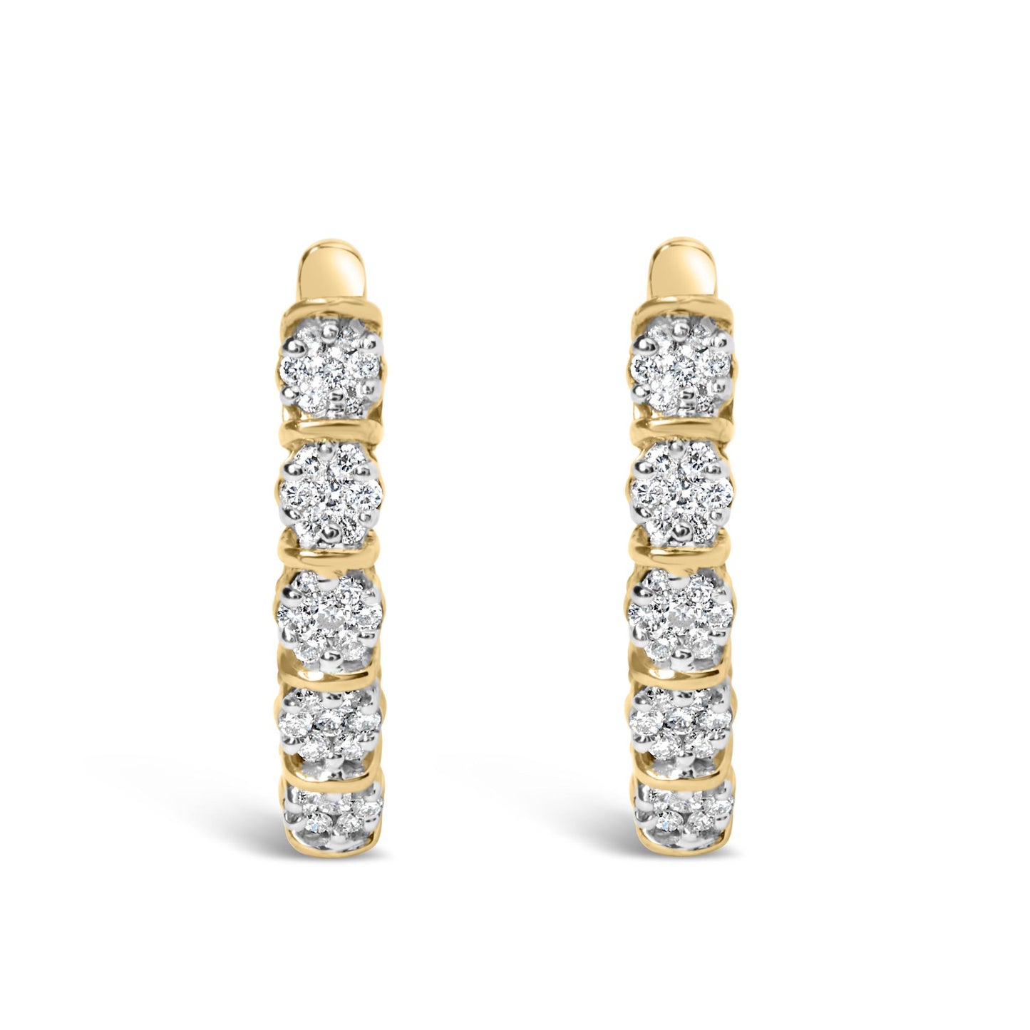 Front view of a pair of yellow metal hoop earrings featuring multiple round white gemstones in prong settings along the outer edge.