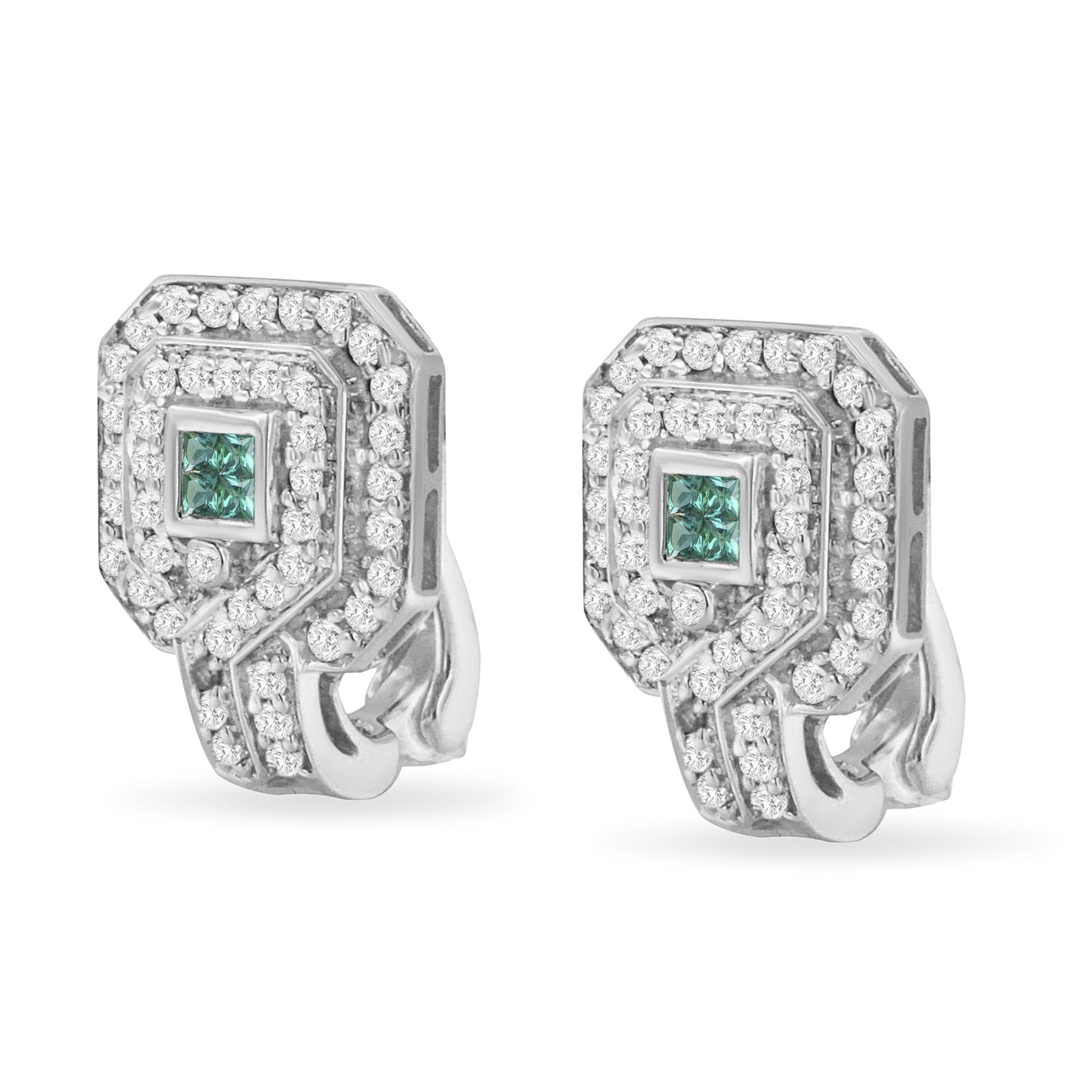 Pair of white metal earrings with a geometric design, featuring round white gemstones in a pave setting surrounding princess-cut blue gemstones in an invisible setting, shown from a front angle.