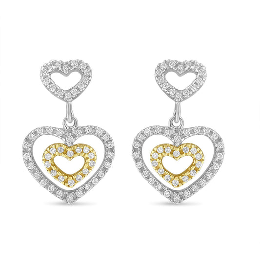 Front view of two-toned heart-shaped dangle earrings with pave-set white round gemstones arranged in three concentric heart outlines.