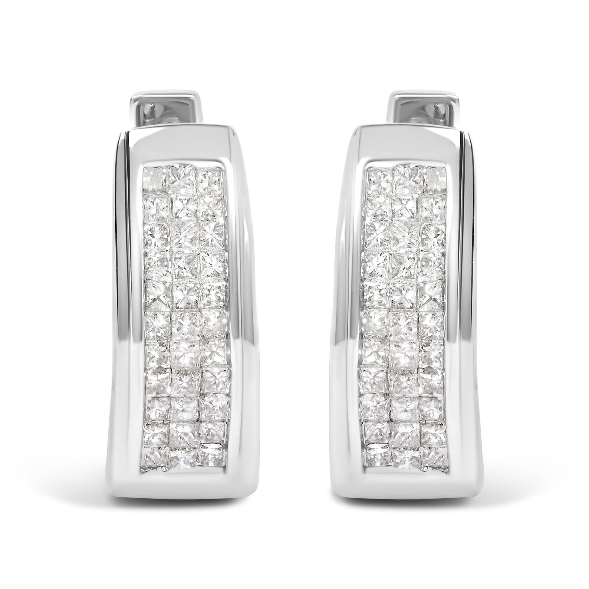 Pair of white metal rectangular earrings with rows of princess-shaped white gemstones in an invisible setting, shown in a front-facing angle.