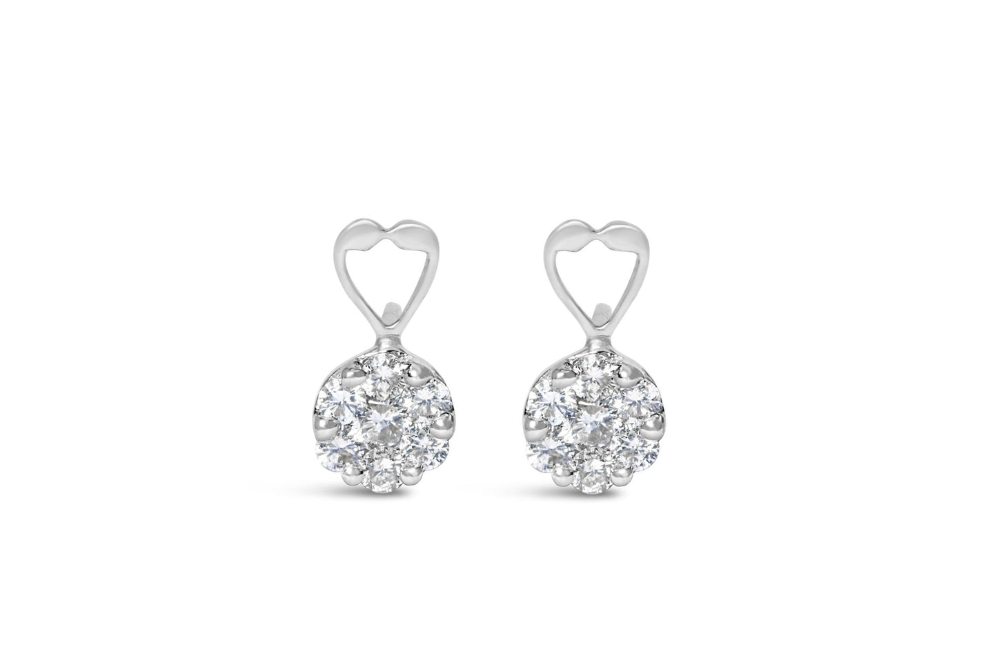 Front view of white metal earrings with heart shaped top and cluster of round prong-set white gemstones.