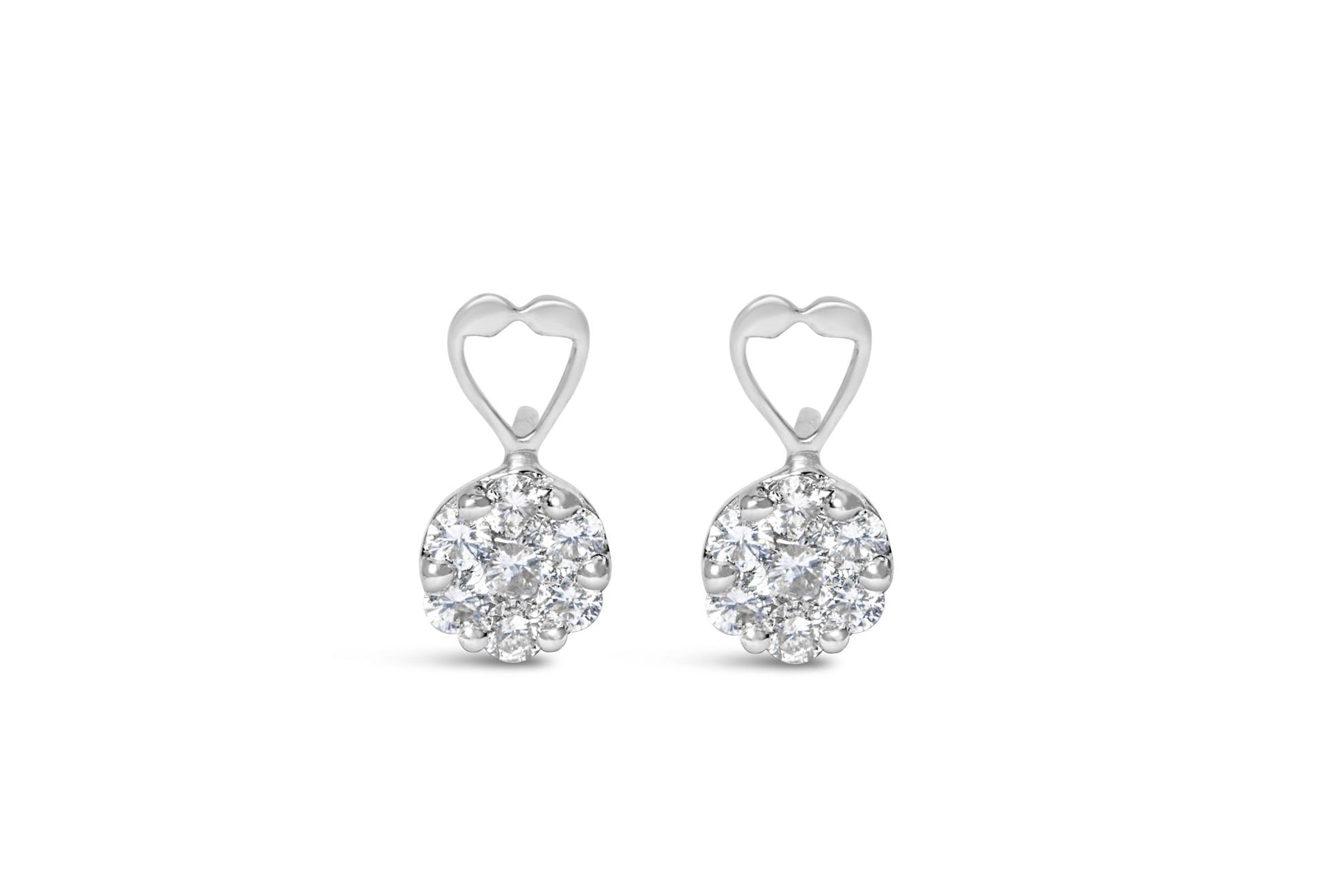 Front view of white metal earrings with heart shaped top and cluster of round prong-set white gemstones.